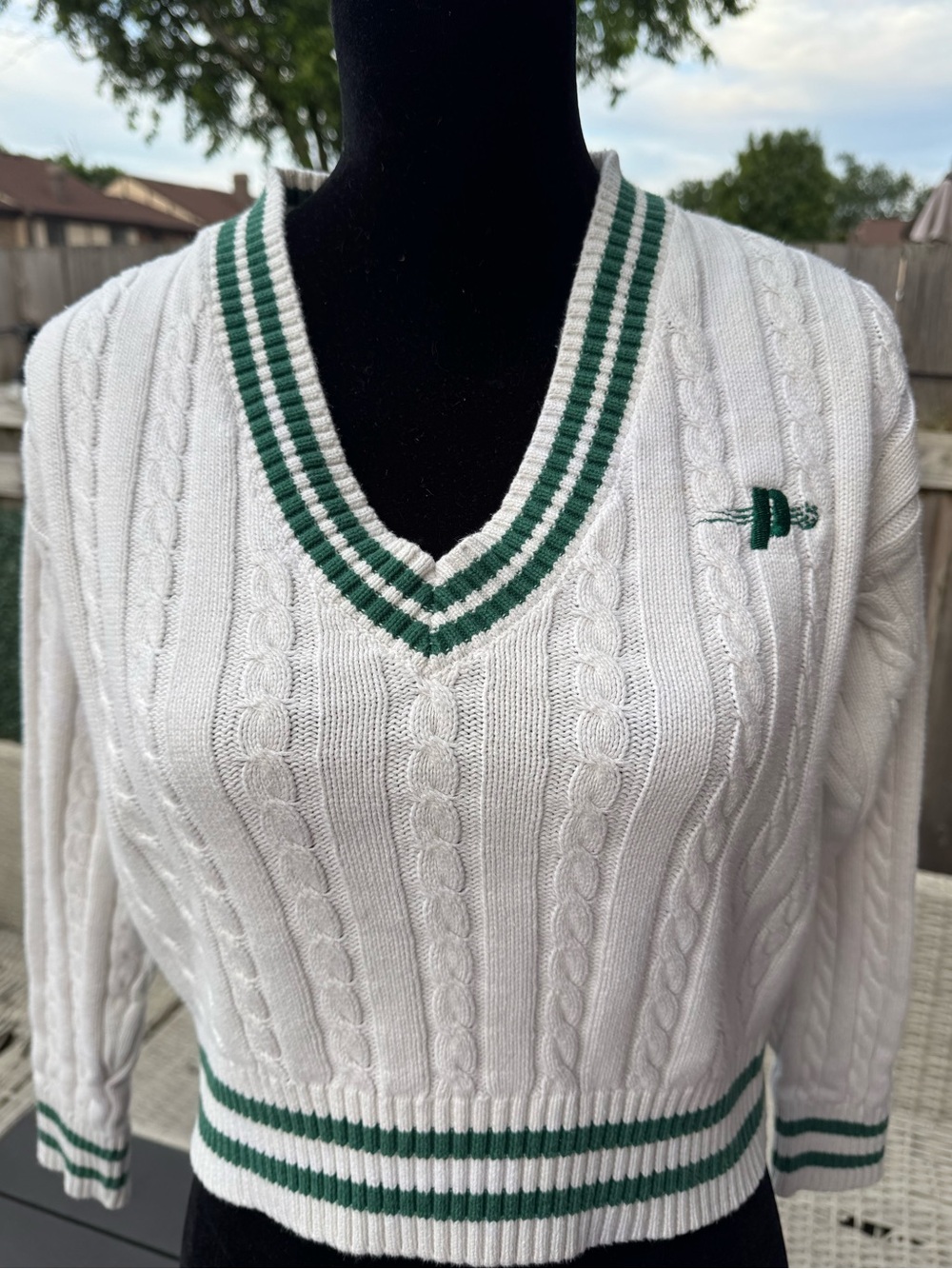 Prince White Cable-Knit V-Neck Sweater with Green Trim